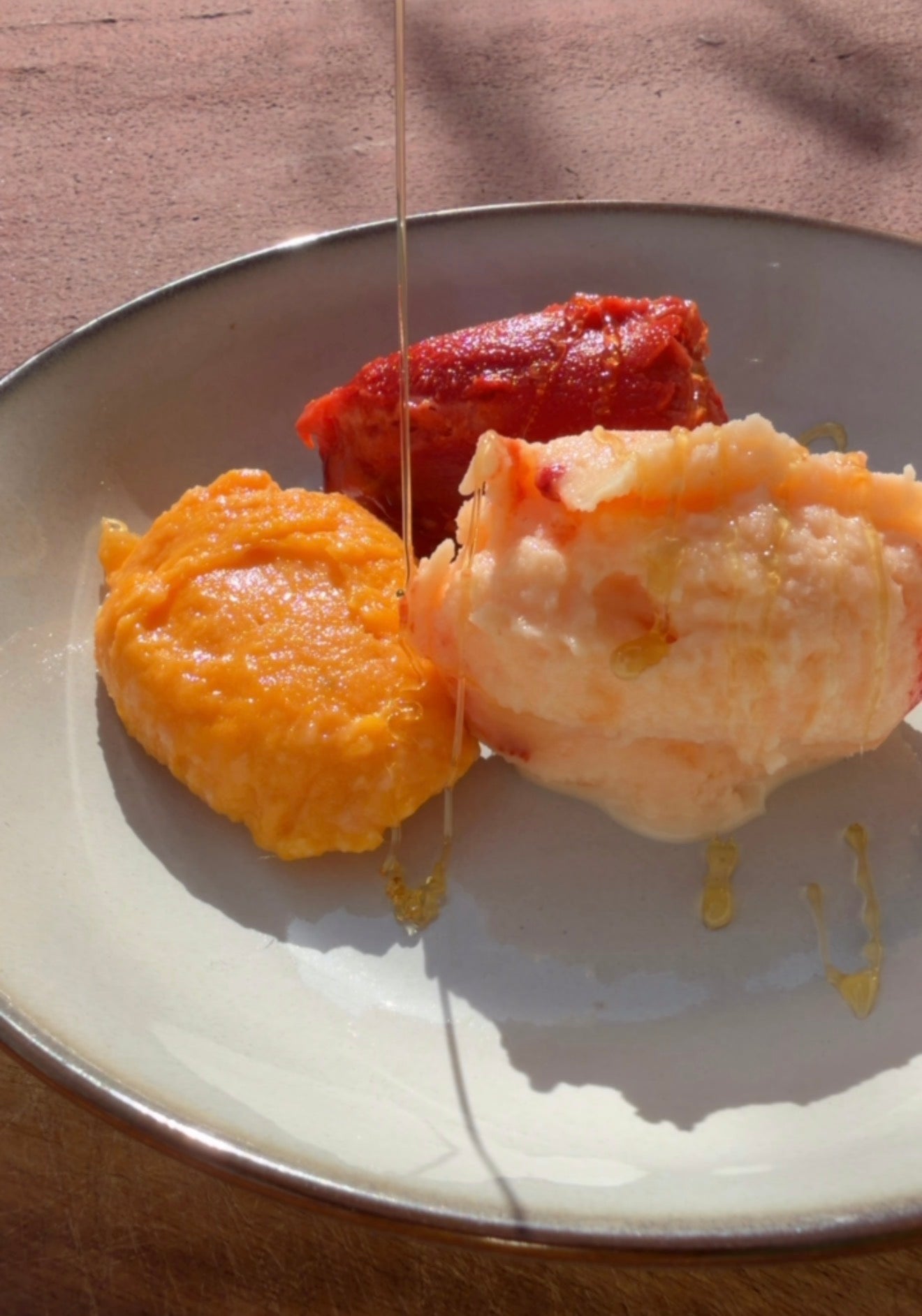 3 scoops of fiber fruit ice cream, topped with a drizzle of honey